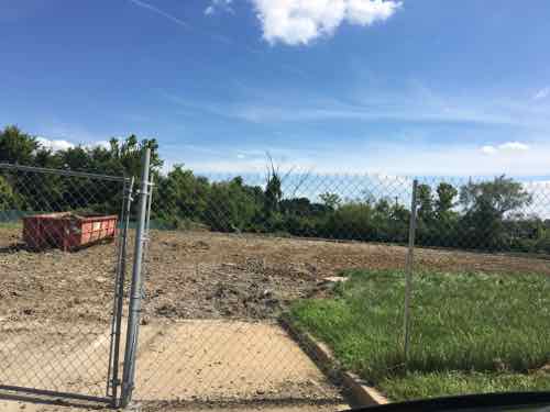 As of Sunday, the site has been cleared. The opportunity still exists to build a more urban building up to the public sidewalk 