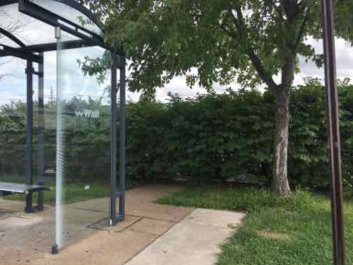 Oh yes, it's wide enough now, But no sidewalk leading to the bus shelter and shrubs are at the back