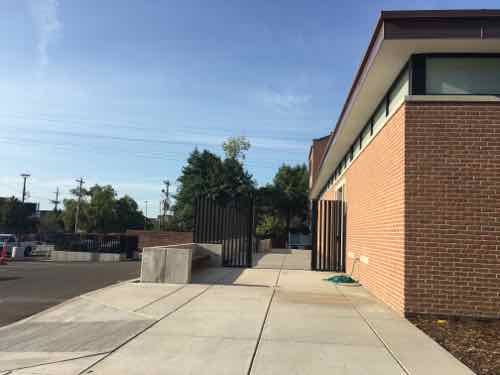 A sidewalk guides you from the front (West) to the entry that faces East. 