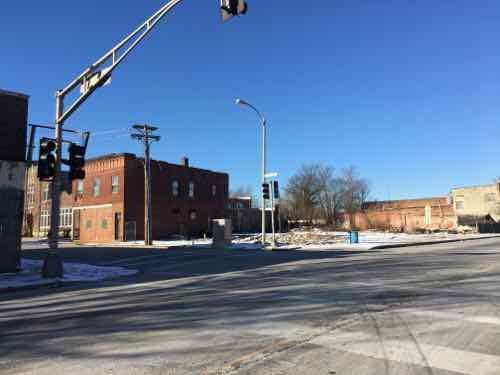 The corner storefront on the SW corner with Taylor is now gone. 