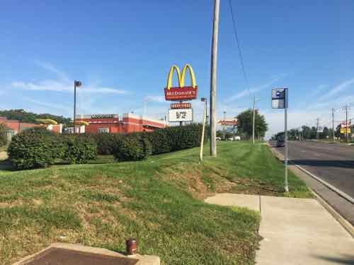 On the NW corner of 159 & Fullerton Rd we see the bus stop needed if we wanted to catch the bus back to the station. There's no sidewalk here, how do we reach the store? 