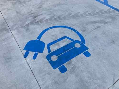 Plug in graphic painted on paving 