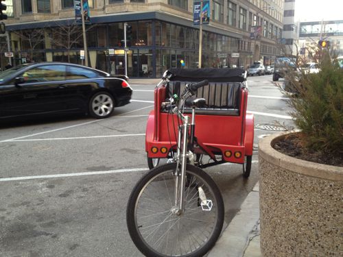 ABOVE: A pedicab parked on 9th in fromt of Culinaria 