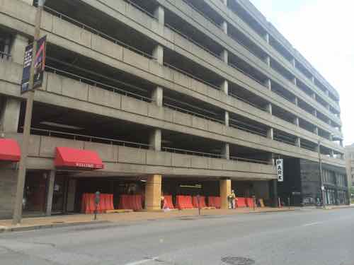 On July 1, 2014 I posted this image to Twitter & Facebook saying "Workers are prepping the parking garage at Tucker & Locust for rehab (refresh concrete)"