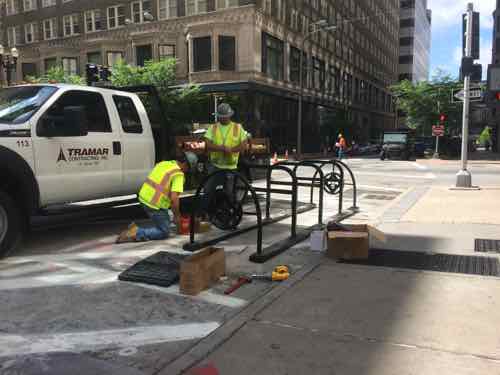 May 26th I posted this image to Twitter & Facebook of the new rack being installed on 9th Street