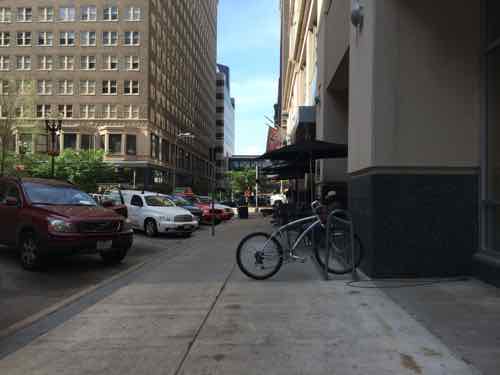 Yesterday morning only one bike was parked in front of the store, narrowing the sidewalk.  