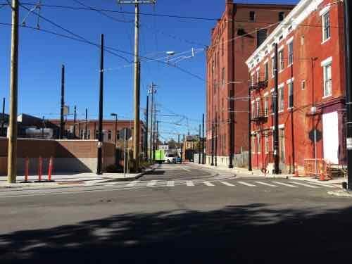 The far end of the initial line is Henry St., now closed to cars because streetcars will enter/exit maintenance yard to the left. This is at the edge of Cincinnati's Brewery District