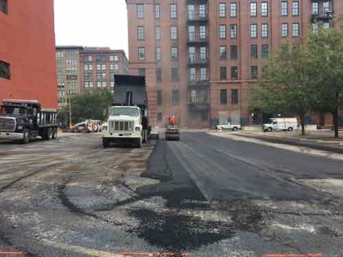 Monday morning October 2nd they were adding a new layer of asphalt one the deteriorated center section 